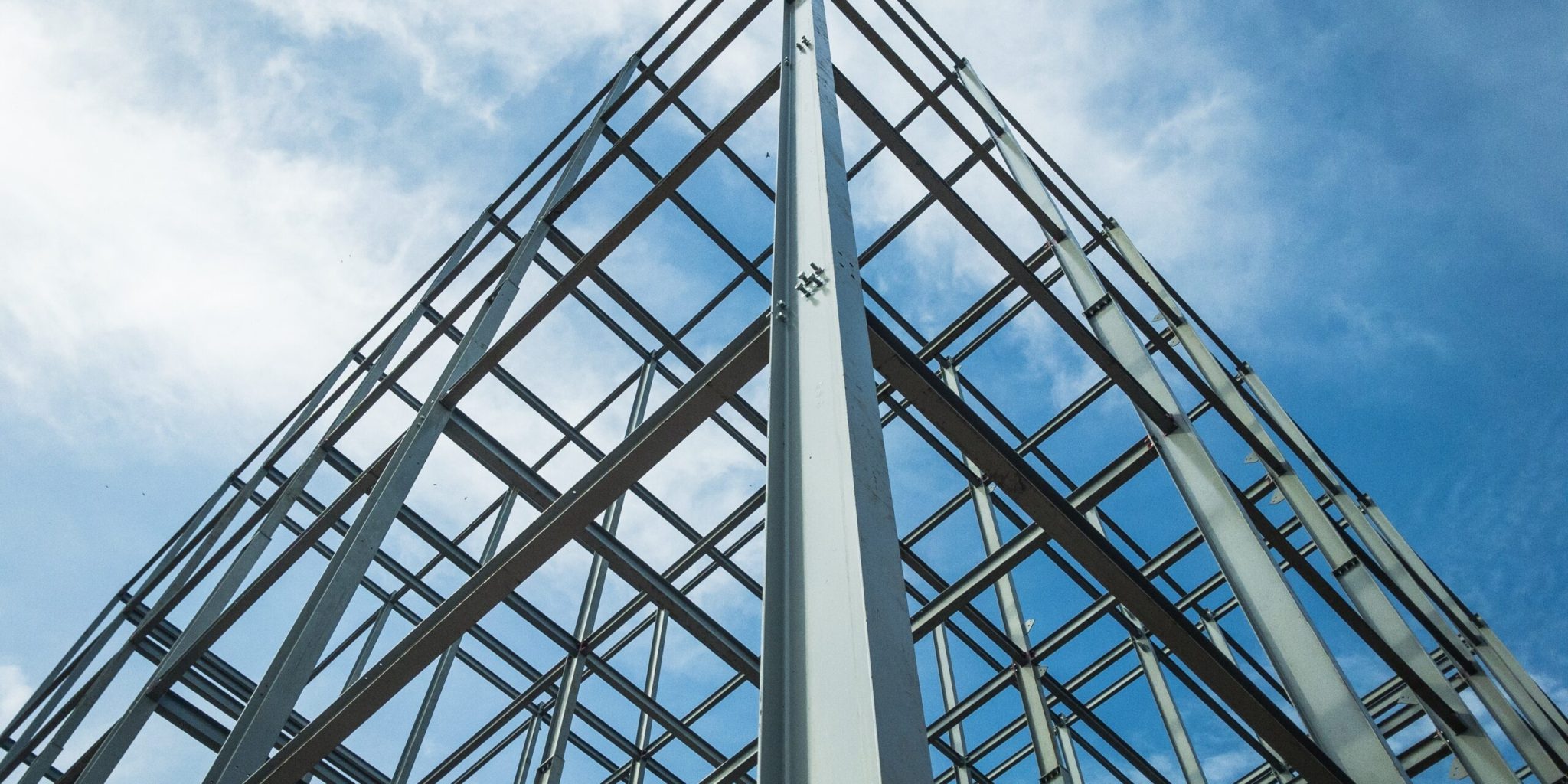 Structure,Of,Steel,For,Building,Construction,On,Sky,Background.